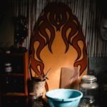 a blue bowl sitting on top of a wooden table